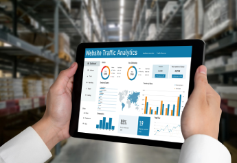 consultant reviewing supply chain controls and standardized work metrics on a tablet dashboard