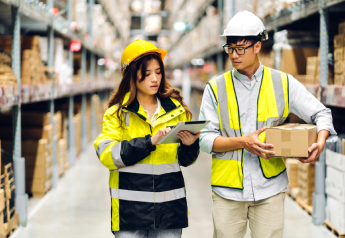 warehouse supervisors reviewing inventory controls and frontline buy-in during consulting engagement