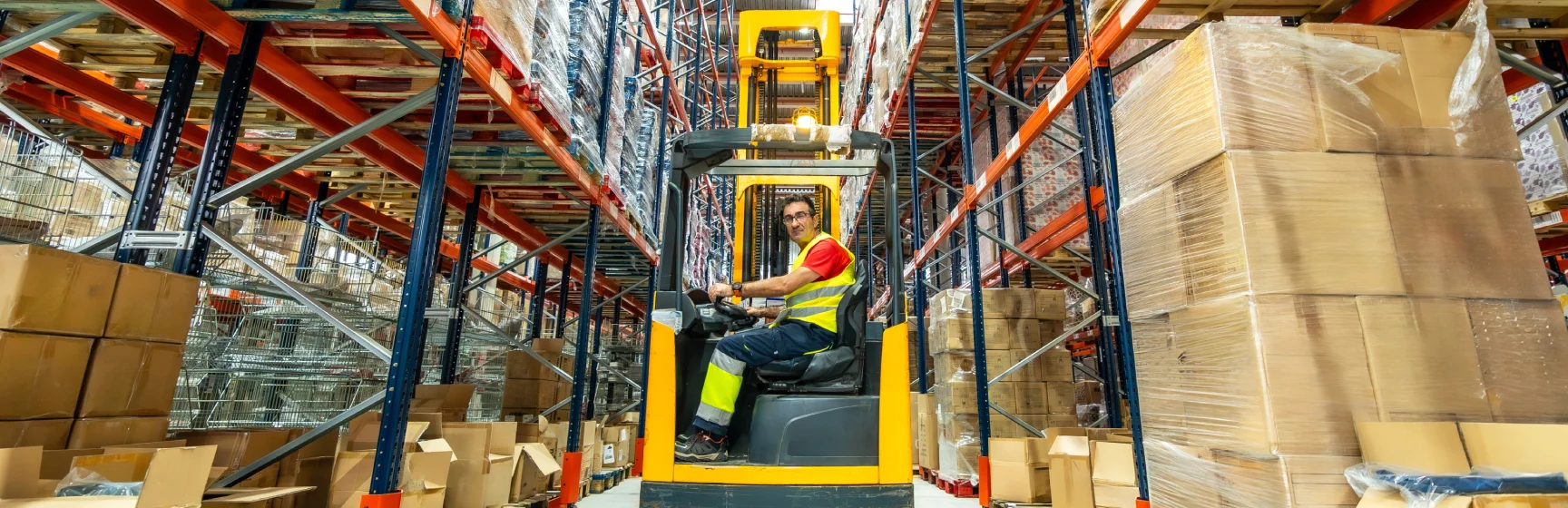 Supply chain consulting warehouse forklift operator managing distribution center operations