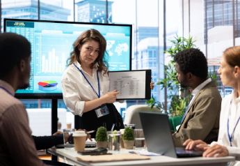 L&D leader reviewing training performance metrics and business outcomes