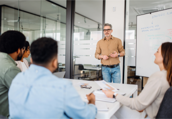 business transformation consultant leading strategy session with client team