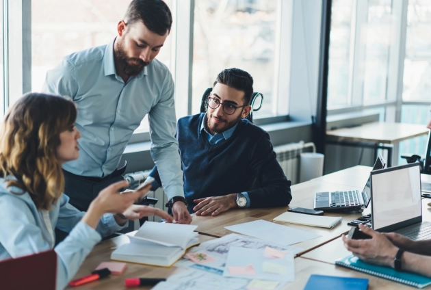 consulting team collaborating on an AI implementation consulting engagement for a mid-sized business