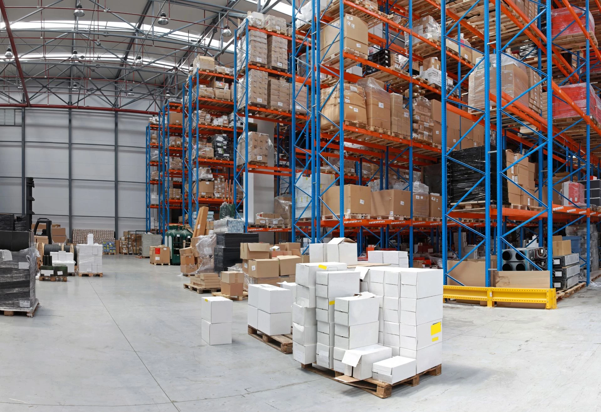 Empty warehouse shelf representing stockout cost and inventory management failure