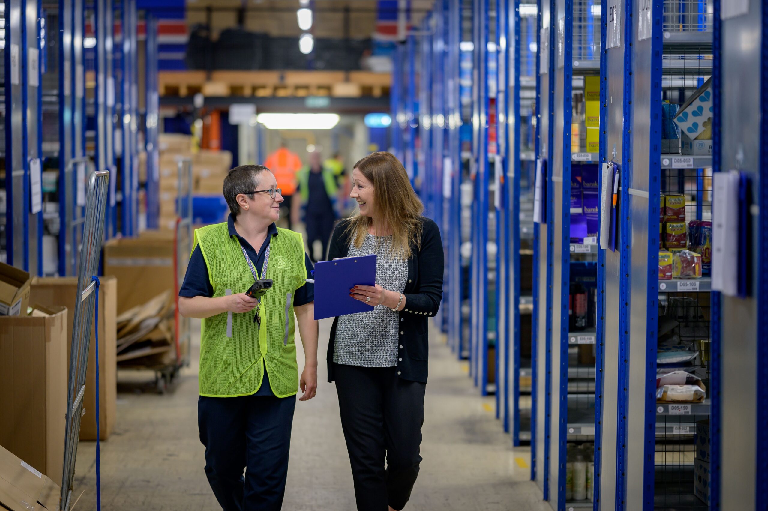Manufacturer reviewing production schedule and order fulfillment from a 3rd party vendor management provider